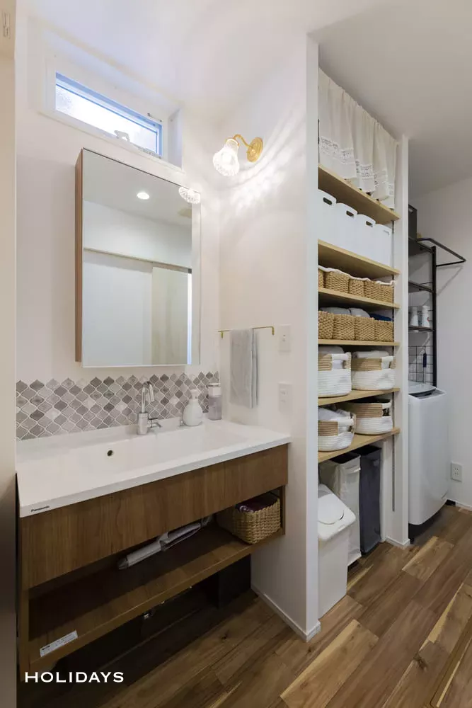 ガレージスペースで趣味を満喫するカントリーテイストの家