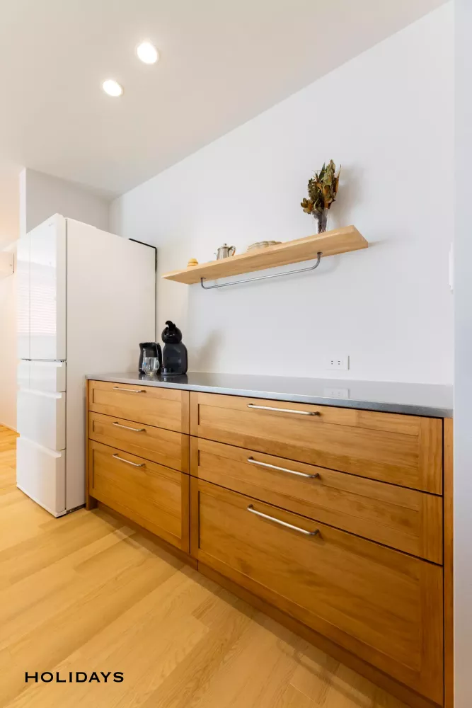 階段下ヌックとスキップフロアで家族団らんを