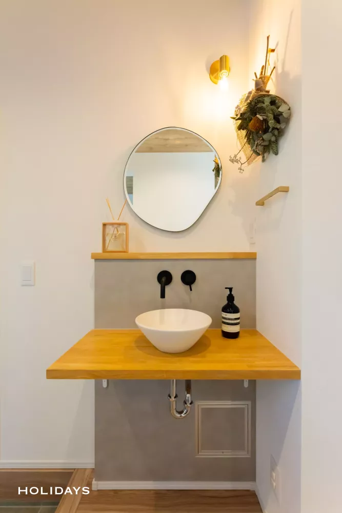 帰りたくなる玄関と回遊性の高さが魅力のガレージハウス