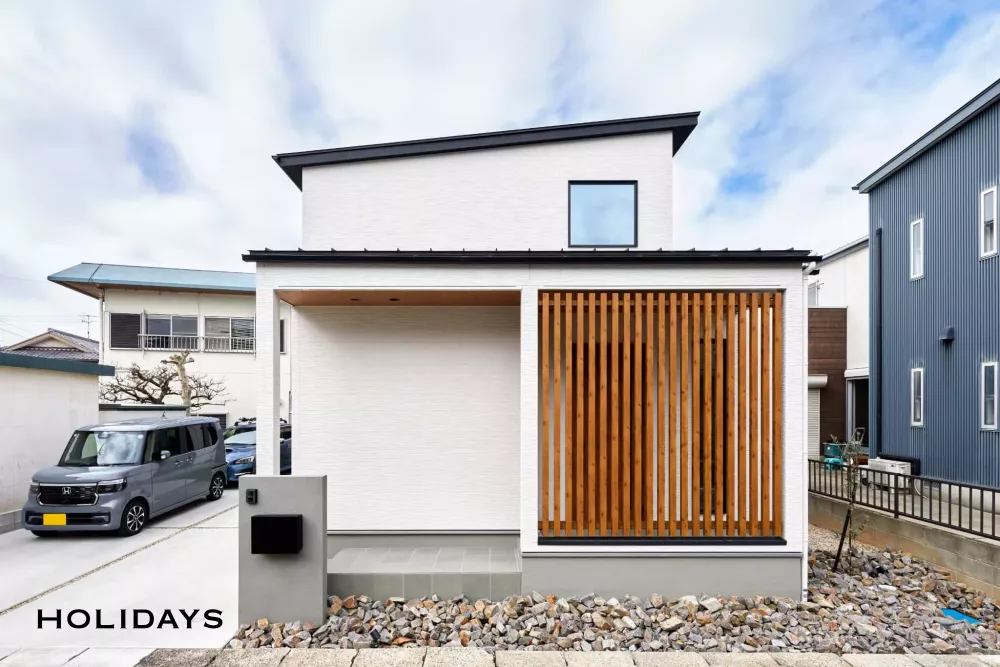 帰りたくなる玄関と回遊性の高さが魅力のガレージハウス