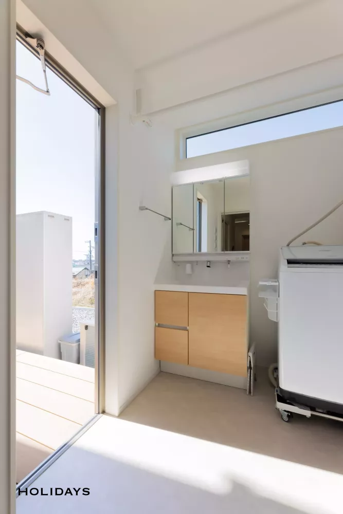 大開口の窓で開放感を演出したナチュラルモダンな家