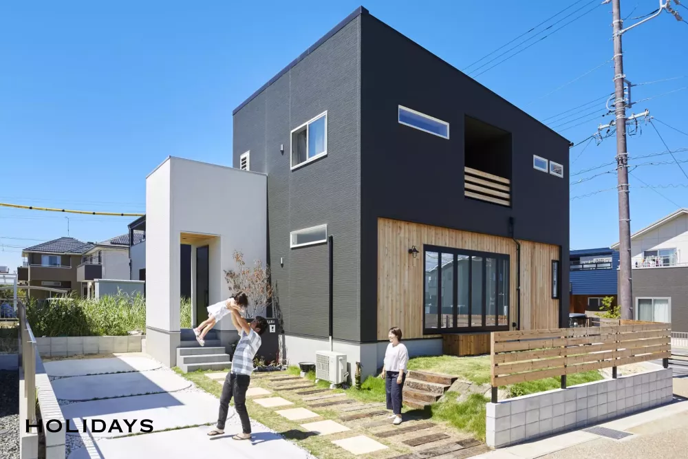 木のアクセントが映える家