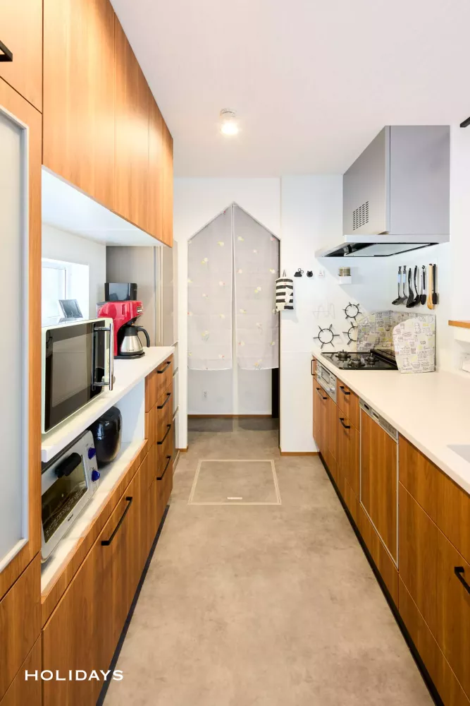 趣味の時間を楽しめる、開放的なリビングの家