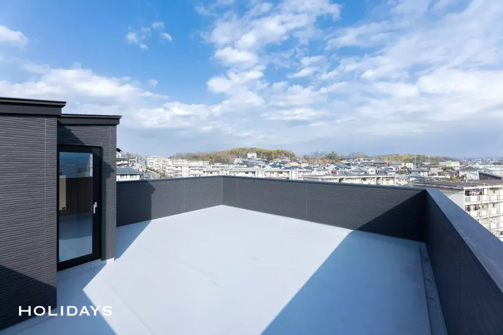 屋上からの眺望を楽しむ家
