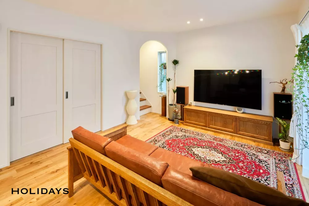 ウッドデッキで繋がる開放的なアメリカンハウス