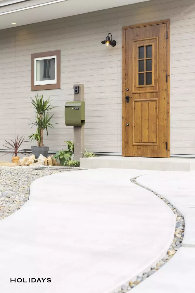 ウッドデッキで繋がる開放的なアメリカンハウス