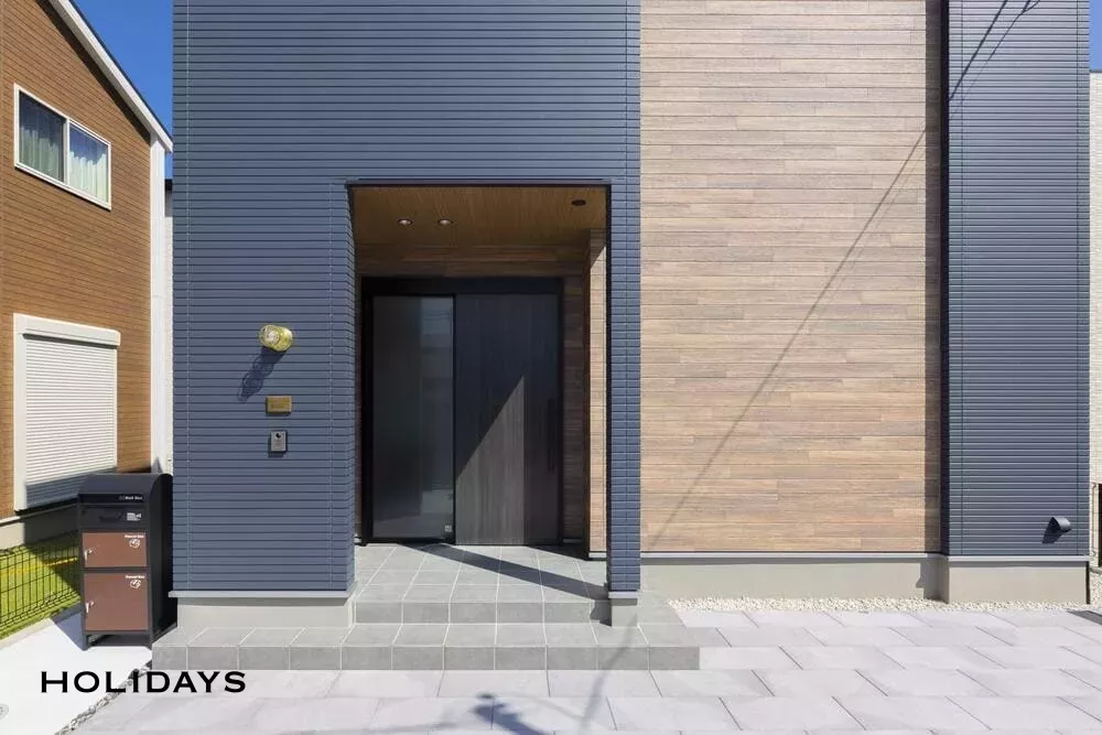 2階リビングの木に囲まれた心地よいお家