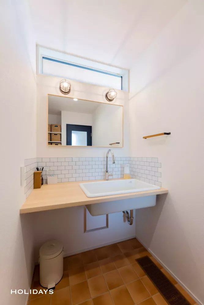 2階リビングの木に囲まれた心地よいお家