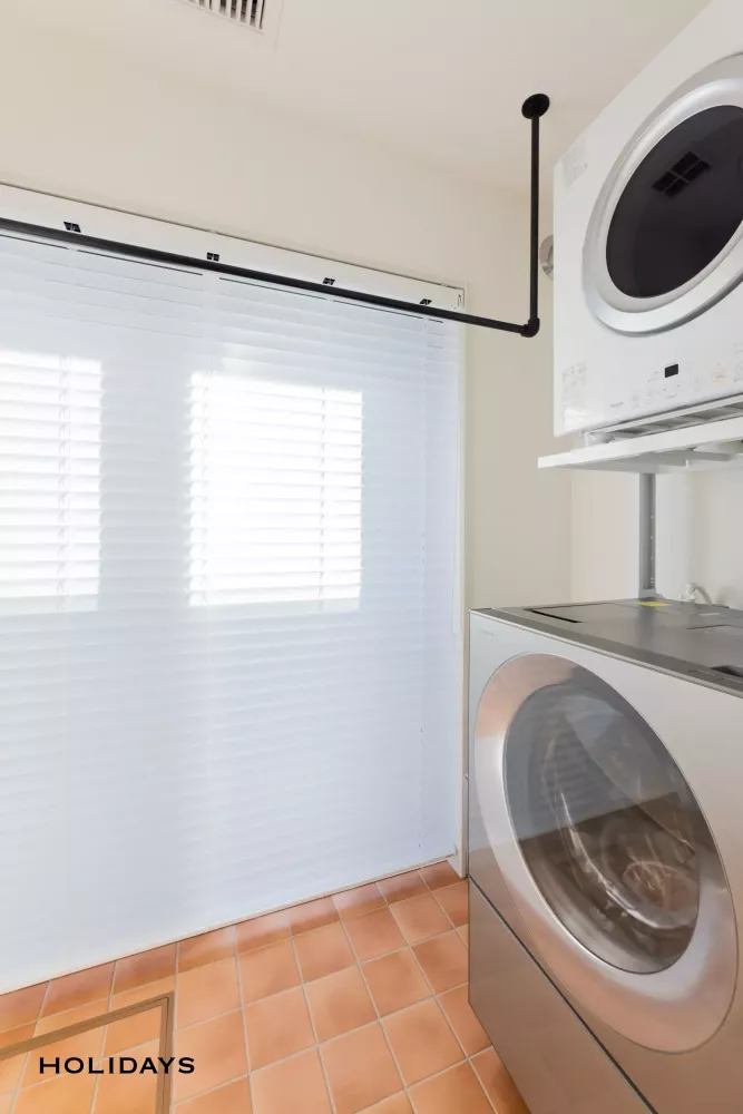 2階リビングの木に囲まれた心地よいお家