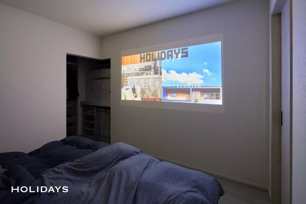 2階リビングの木に囲まれた心地よいお家