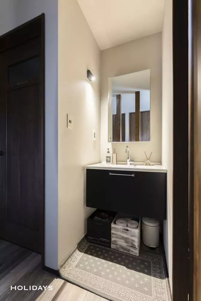 吹き抜けを採用した趣味と暮らすアメリカンテイストの家