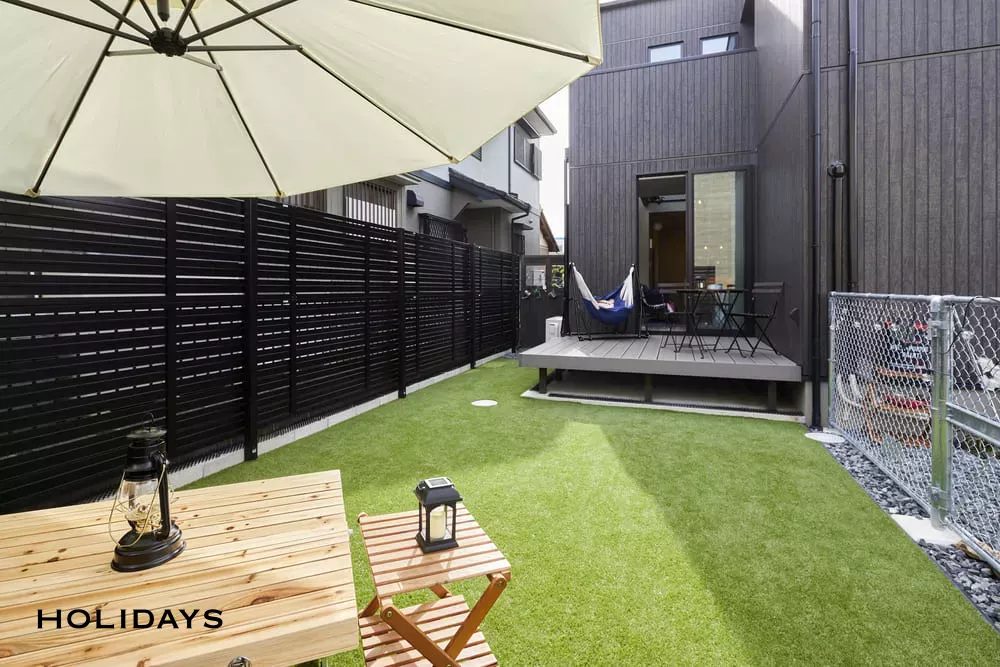 吹き抜けを採用した趣味と暮らすアメリカンテイストの家