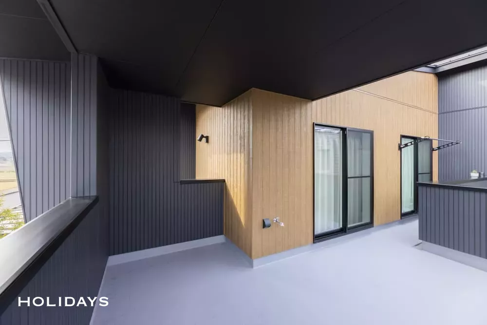 中庭+吹き抜けのある大人カジュアルな住まい